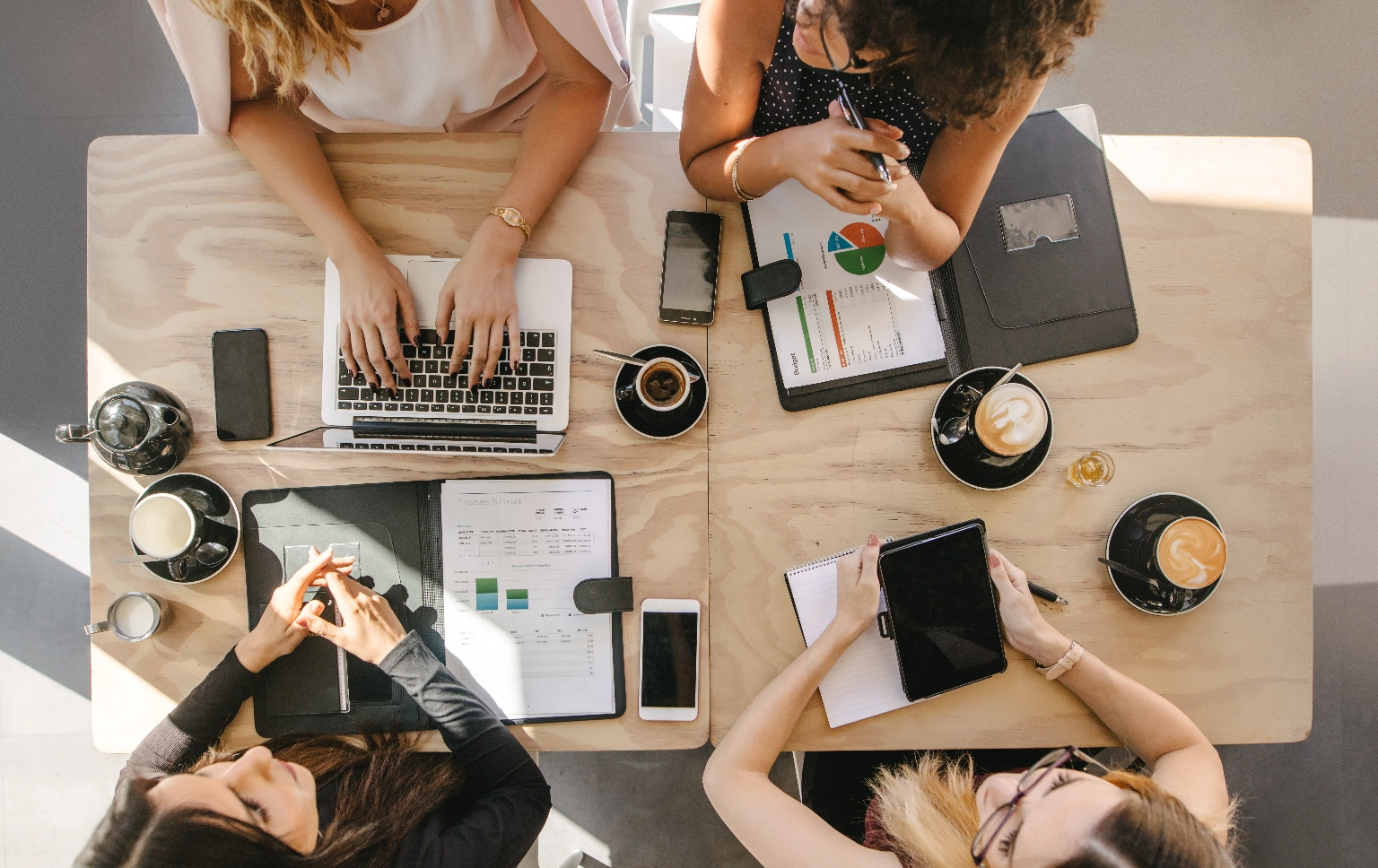 Employees Sitting Around a Table